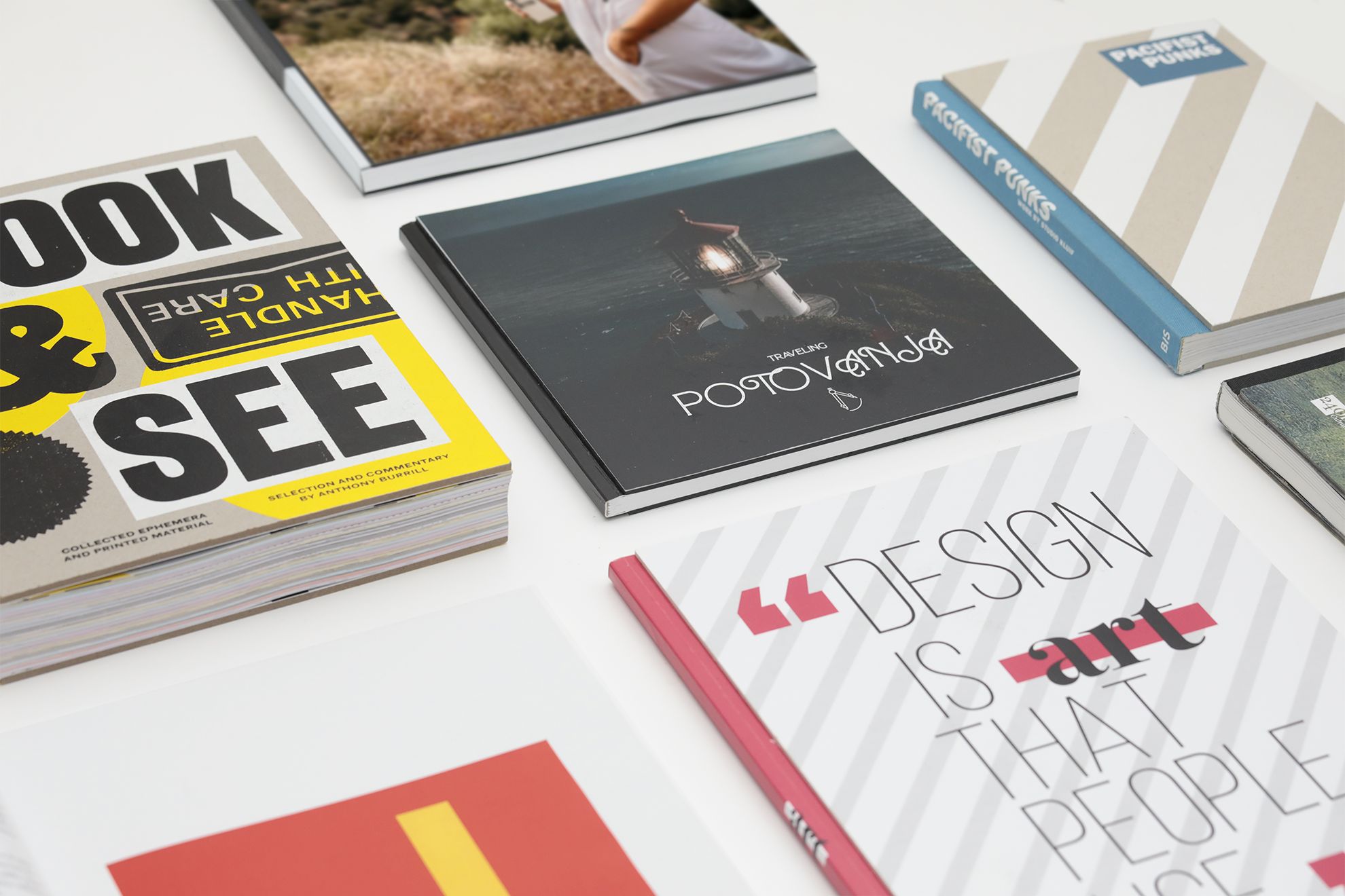 Premium hardcover books and custom bound print materials showcasing professional Bodonian Binding craftsmanship. Each piece demonstrates the quality of personalized online printing services available through Sprint24. Perfect for design portfolios, bespoke publications, and projects requiring superior binding quality.