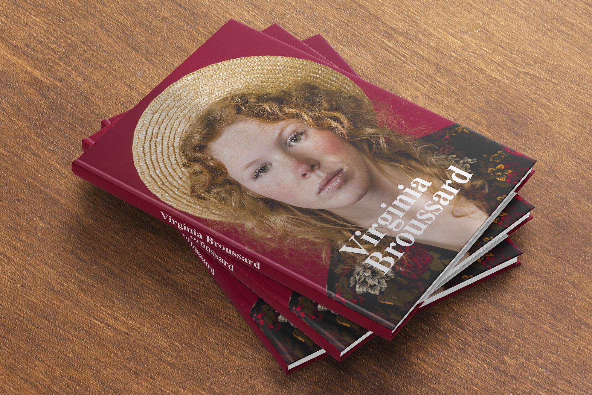 Stack of burgundy hardcover books with portrait cover design Stack of burgundy hardcover books showcasing professional editorial printing solutions. Sprint24.