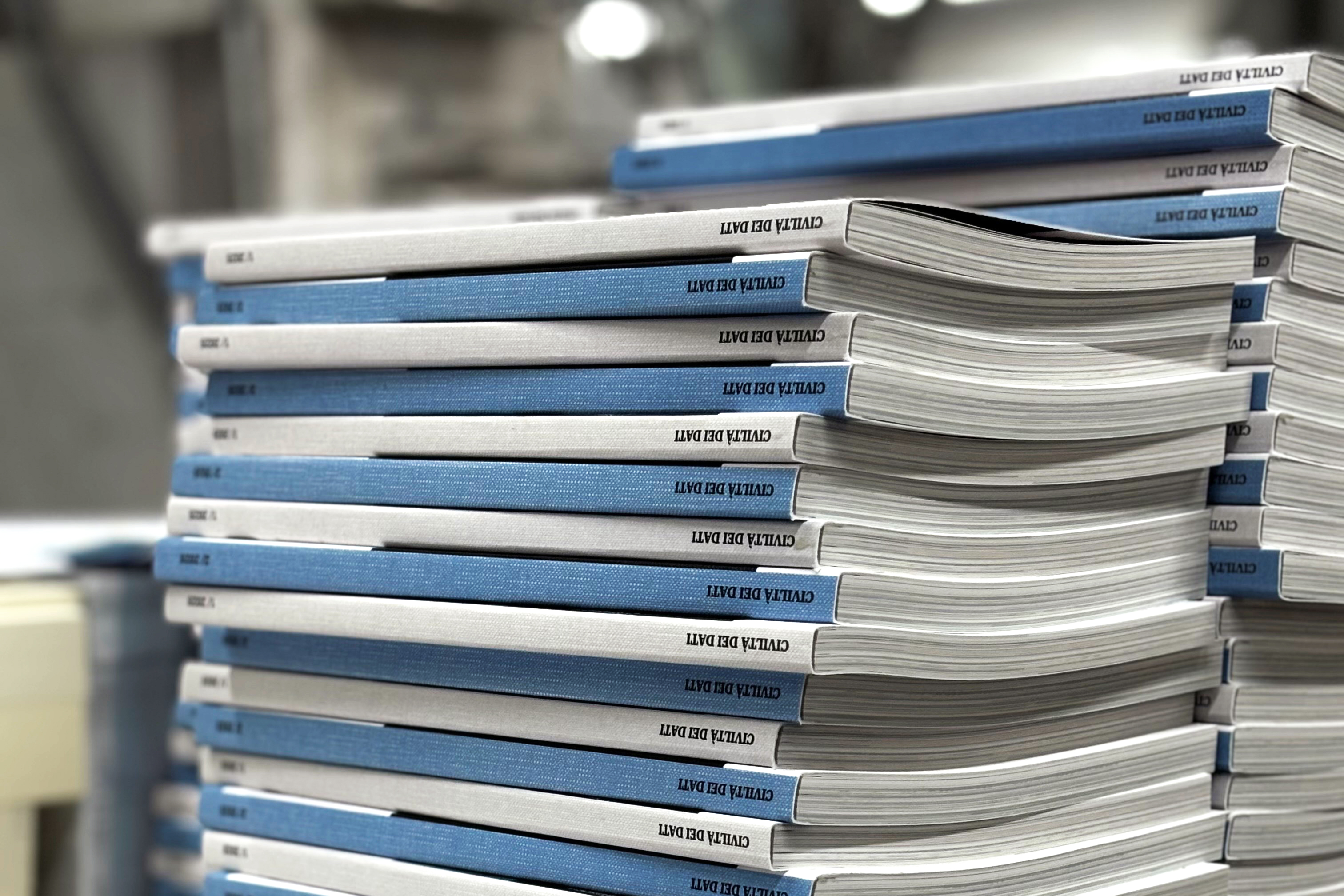 Digital book printing with customizable covers and durable binding for self-publishing reports. Sprint24.