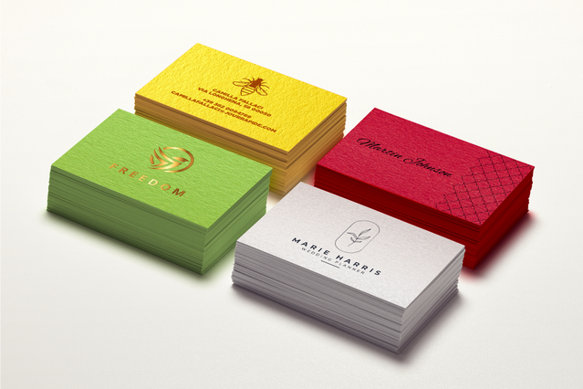 A professional selection of colored business cards arranged in yellow, green, burgundy, and white, showcasing the vibrant color options available. Each card features premium colored paper stock with excellent print quality, ideal for creating memorable branded impressions. Customize and order your own colored business cards online with Sprint24's simple personalization interface.