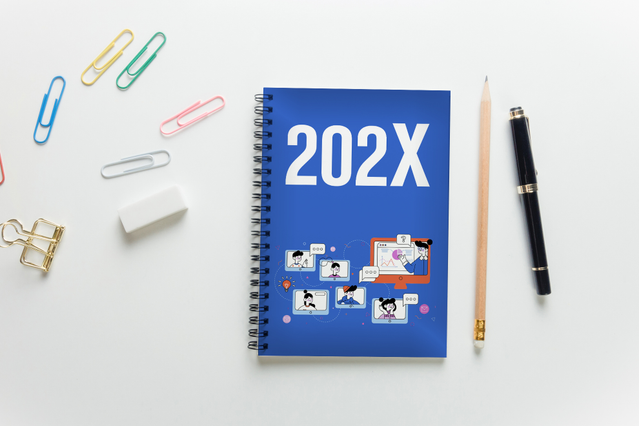 A metal spiral-bound agenda with a vibrant blue cover featuring illustrated graphics sits on a white desk alongside a pencil, pen, and colorful paper clips. The customizable cover design showcases the branding potential of personalized spiral agendas. Ideal for businesses, offices, and individuals looking for a stylish and practical daily planner.
