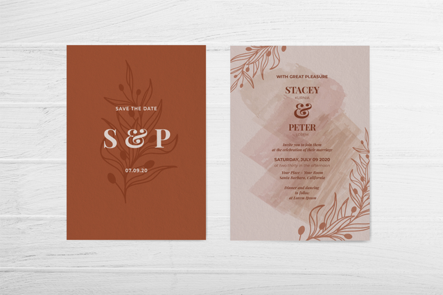 Two elegant wedding invitation cards — a terracotta front cover with gold botanical motifs and 'S&P Save the Date', and a blush programme card with fine floral line art on a wooden surface. Sprint24 prints custom wedding invitations on premium fine papers, perfect for couples seeking refined, nature-inspired reception invitations with personalized details.