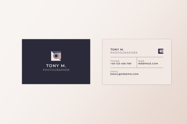 This elegant business card design showcases a minimalist two-tone layout perfect for photographers seeking professional brand presence. The dark navy front features a photographer's name and camera icon for visual interest, while the cream back displays contact information with refined typography. Fully customizable for photographers who demand high-quality, sophisticated printing that represents…