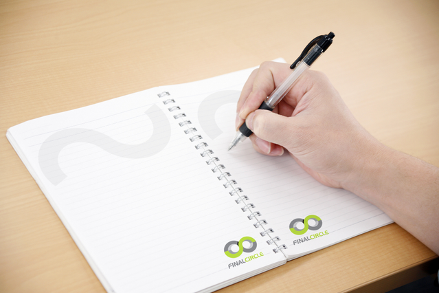 Metal spiral notebook with white lined pages for office and corporate use. Ideal for personalized branding and company gadgets. Perfect for meetings, note-taking, and promotional campaigns.