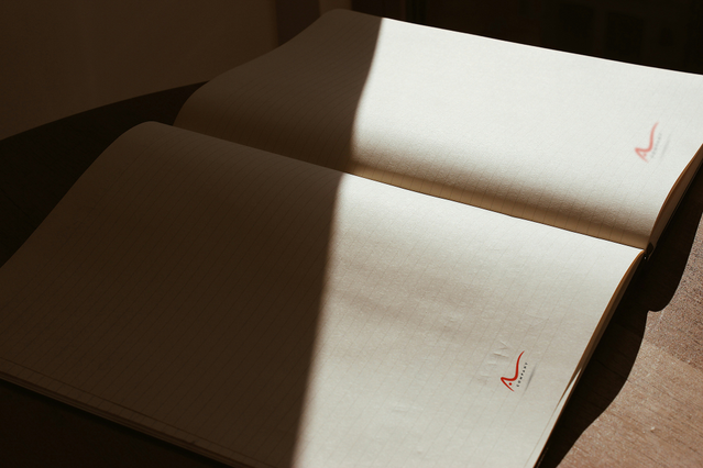 Explore our A4 stapled notebook template featuring durable metal spine binding and cream-colored interior pages. Perfect for journals, planners, and branded notebooks, these custom-printed templates offer professional finishing ideal for corporate gifts and business planning solutions.