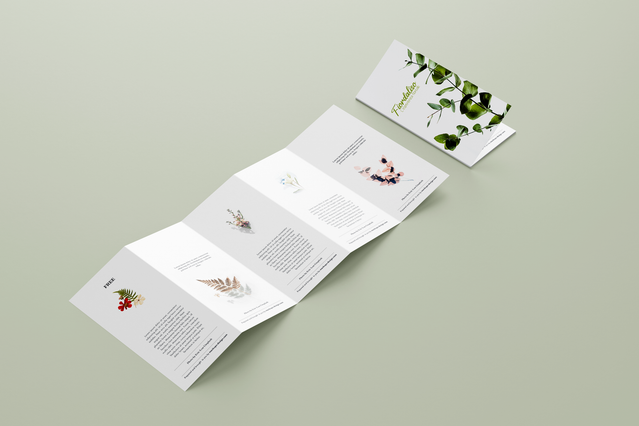 An open five-panel penta-fold accordion brochure with delicate botanical floral illustrations — pine branches, berries, wildflowers and vines — on a light sage green background, plus a folded version showing the cover design. Custom-printed five-panel brochures with botanical illustration are perfect for florists, wellness brands, organic products, wedding stationery and nature-inspired businesse…