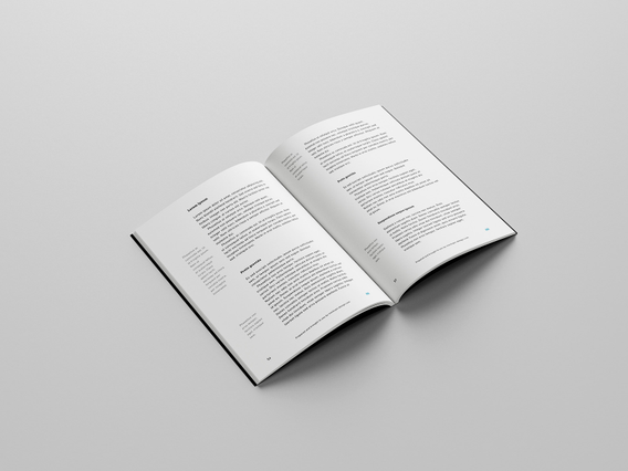 Open printed catalogue white interior pages text columns minimal. Open catalogue with white interior pages, structured text columns and minimal typography. Custom Sprint24.