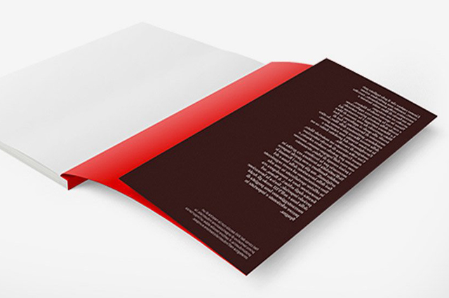 Perfect-bound brochure with striking red spine band accent for premium marketing collateral. Sprint24.