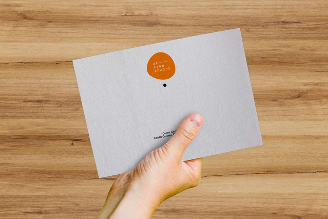 Splendorgel Extra White envelope featuring a relief-printed orange Pantone color design. This image showcases the delicate, velvety texture and smooth finish of premium extra white paper, ideal for luxury correspondence. Perfect for invitations, formal business envelopes, and special occasions requiring professional letterpress embossing.