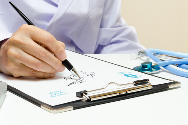 Professional letterhead paper featuring a doctor writing on a clipboard with stethoscope visible. Premium quality customizable sheets designed for medical professionals, doctors' offices, and healthcare practices. Order personalized doctor letterhead paper online with Sprint24.