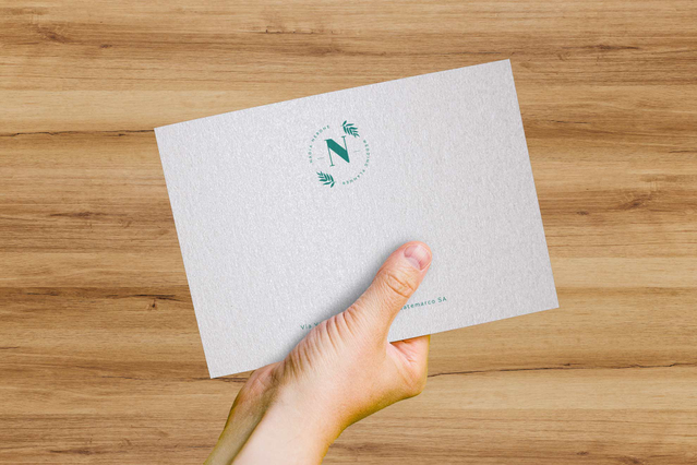 This white Sirio Pearl envelope showcases elegant green foil stamping with a premium pearlescent surface finish. The letter envelope features professional hot foil embossing that adds sophistication and visual appeal. Perfect for luxury stationery, invitations, weddings, and branded correspondence on high-reflectance pearl paper.