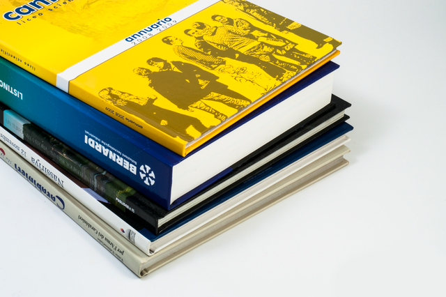 Professional hardcover books demonstrate premium quality bookbinding ideal for novels, atlases, dictionaries, and business presentations. These durable covers provide elegance and lasting quality, giving your publications a prestigious appearance that impresses readers. Hardcover binding offers the perfect balance of protection and sophistication for important collections.
