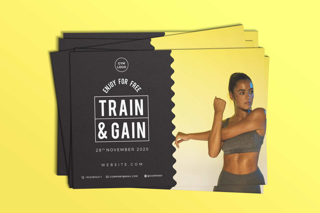 A stack of black and yellow 'Train & Gain' gym fitness promotional cards with die-cut notch edges and a female boxer on a yellow background. Sprint24 prints extra thick 400gr cards perfect for gyms, fitness studios and sports event promotions — strong, elegant and ideal for mailing campaigns, event invitations and branded marketing handouts.