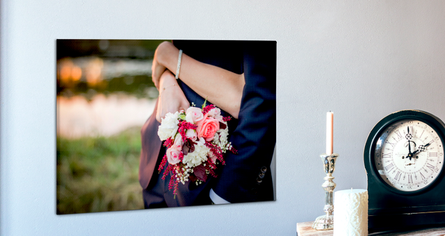 Display your most precious wedding moments as stunning canvas art. This photo canvas showcases a beautiful bridal bouquet and groom's suit captured in an elegant interior setting. Transform your favorite wedding photography into timeless wall décor that celebrates your special day.