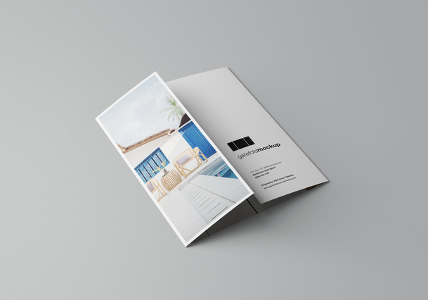 A clean white gate-fold brochure mockup shown closed and slightly open, with Mediterranean travel photography visible on the inner panels. Perfect for showcasing the elegant folding format, this layout suits event invitations, hotel presentations, and premium promotional materials. Customize and print gate-fold brochures online with Sprint24.