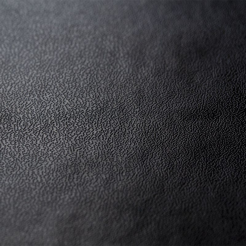 Black Leather hardcover: Cover realised in Synthetic black leather (PVC and cardboard treated Skinplast) and cardboard core.