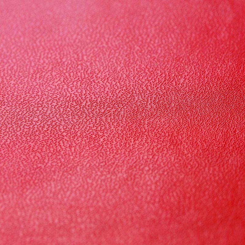 Red leather hardcover: Cover realised in Synthetic red leather (PVC and cardboard treated Skinplast) and cardboard core.
