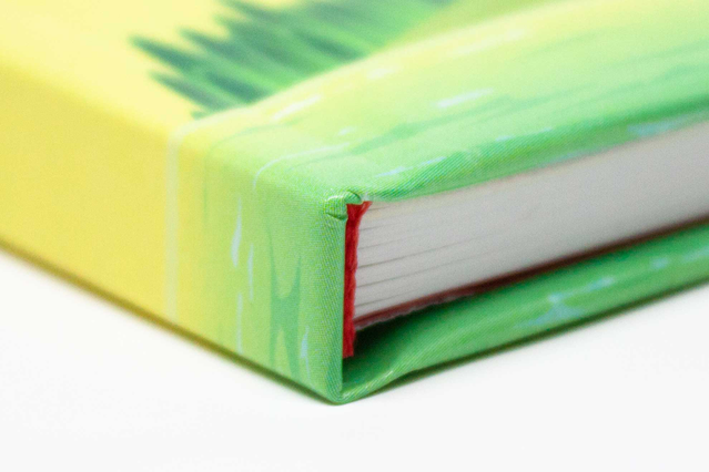 Padded Hardcover: Cover realised with 170 gr FSC certified Symbol Satin coated paper, and rigid cardboard and sponge core